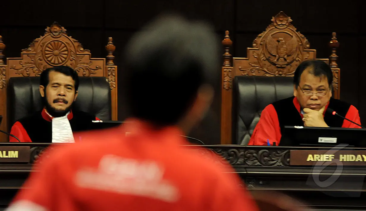 Mahkamah Konstitusi (MK) menggelar Sidang Pengujian Undang-Undang Nomor 39 Tahun 2004 tentang Penempatan dan Perlindungan Tenaga Kerja Indonesia di Luar Negeri (UU PPTKILN) di Gedung MK Jakarta, Rabu (18/3/2015).(Liputan6.com/Johan Tallo)