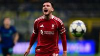 Bek Liverpool asal Skotlandia #26, Andrew Robertson, bereaksi selama pertandingan matchday ke-6 Liga Champions UEFA antara Inter Milan dan Liverpool di Stadion San Siro, Milan, pada 9 Desember 2025. (Marco BERTORELLO/AFP)