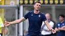 Ahli taktik Italia-Brasil itu menangani Bologna di Serie A dan berhasil menuntun tim merebut tiket ke Liga Champions musim depan. (GABRIEL BOUYS / AFP)