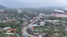 Foto udara menunjukkan rumah-rumah dengan atap yang hancur di kota Santa Ana, provinsi Cagayan, sebelah utara Manila pada Jumat 8 November 2024. (John DIMAIN/AFP)