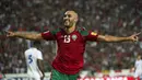 Pemain Moroko, Boutaib Khalid mencatatkan namanya sebagai bagian dari top scorer kualifikasi Piala Dunia 2018 zona Afrika. Khalid mengoleksi empat gol sepanjang kualifikasi tersebut. (AFP/Fadel Senna)