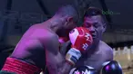Jon Jon Jetz (kiri) melakukan uppercut ke wajah Frans Damur  pada laga Flyweight Mahkota Boxing Super Series di Cilandak Town Square, Jakarta (10/3/2018). Jon Jon Jetz menang angka mutalak atas Frans. (Bola.com/Nick Hanoatubun)