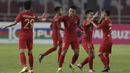 Para pemain Timnas Indonesia merayakan gol yang dicetak Alfath Faathier ke gawang Timor Leste pada laga Piala AFF 2018 di SUGBK, Jakarta, Selasa (13/11). (Bola.com/M. Iqbal Ichsan)