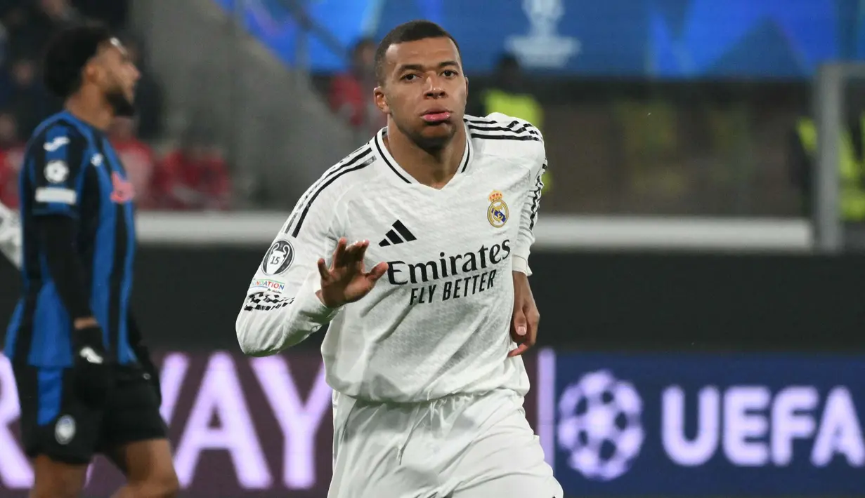 Pada menit ke-10, Real Madrid membuka keunggulan lewat gol yang dicetak Kylian Mbappe. (Alberto PIZZOLI/AFP)