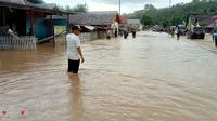 Banjir yang menerjang desa Mohungo, Kecamatan Tilamuta, Kabupaten Boalemo (Arfandi Ibrahim/Liputan6.com)