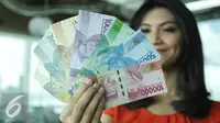 Bank Indonesia (BI) meluncurkan 11 uang rupiah Emisi 2016 dengan gambar pahlawan baru. (Liputan6.com/Fatkhur Rozaq)