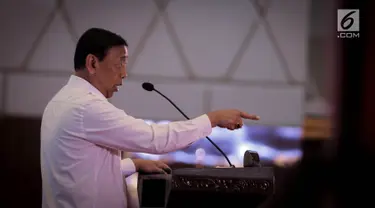 Menko Politik, Hukum, dan Keamanan (Polhukam), Wiranto, memberikan arahan dalam Rakornas Bidang Kewaspadaan Nasional di Jakarta, Rabu (27/3). Rakornas tersebut berlangsung dalam rangka pemantapan penyelenggaraan Pemilu 2019. (Liputan6.com/Faizal Fanani)