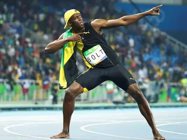 Ekspresi sprinter Jamaika, Usain Bolt, setelah meraih emas lari 100 m Olimpiade Rio 2016, Minggu (14/8/2016). Bolt mencetak hattick setelah meraih emas 100 m di Olimpiade 2008 dan 2012. (Reuters/Lucy Nicholson)