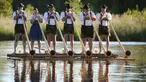 Musisi alphorn, Holdersberger Alp-Traum-Bläser tampil di atas kapal rakit di danau Elbsee, Jerman selatan (11/6). Alphorn ini merupakan alat musik tradisional berupa terompet panjang yang. (AFP PHOTO / DPA / Karl-Josef Hildenbrand / Germany Out)