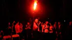 Salah satu suporter ‘’The Reds’ menyalakan flare saat acara nonton bareng Liputan6.com laga Liverpool kontra Manchester United bersama Big Reds reg Bekasi di Alibaba Futsal, Bekasi, Minggu (22/3/2015). (Liputan6.com/Helmi Fithriansyah)