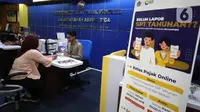 Petugas melayani wajib pajak di Kantor Pelayanan Pajak Pratama Jakarta Tanah Abang Tiga di Jakarta, Selasa (5/3/2024). (Liputan6.com/Angga Yuniar)