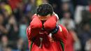 Reaksi pemain timnas Portugal, Cristiano Ronaldo saat gagal mencetak gol lewat tendangan penalti selama pertandingan babak 16 besar Euro 2024 melawan Slovenia di Frankfurt Arena pada 1 Juli 2024. (PATRICIA DE MELO MOREIRA/AFP)