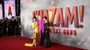 Lucy Liu, Helen Mirren dan Rachel Zegler berpose untuk fotografer setibanya di pemutaran perdana film 'Shazam! Fury of the Gods' di London, Selasa (7/3/2023). (Photo by Alberto Pezzali/Invision/AP)