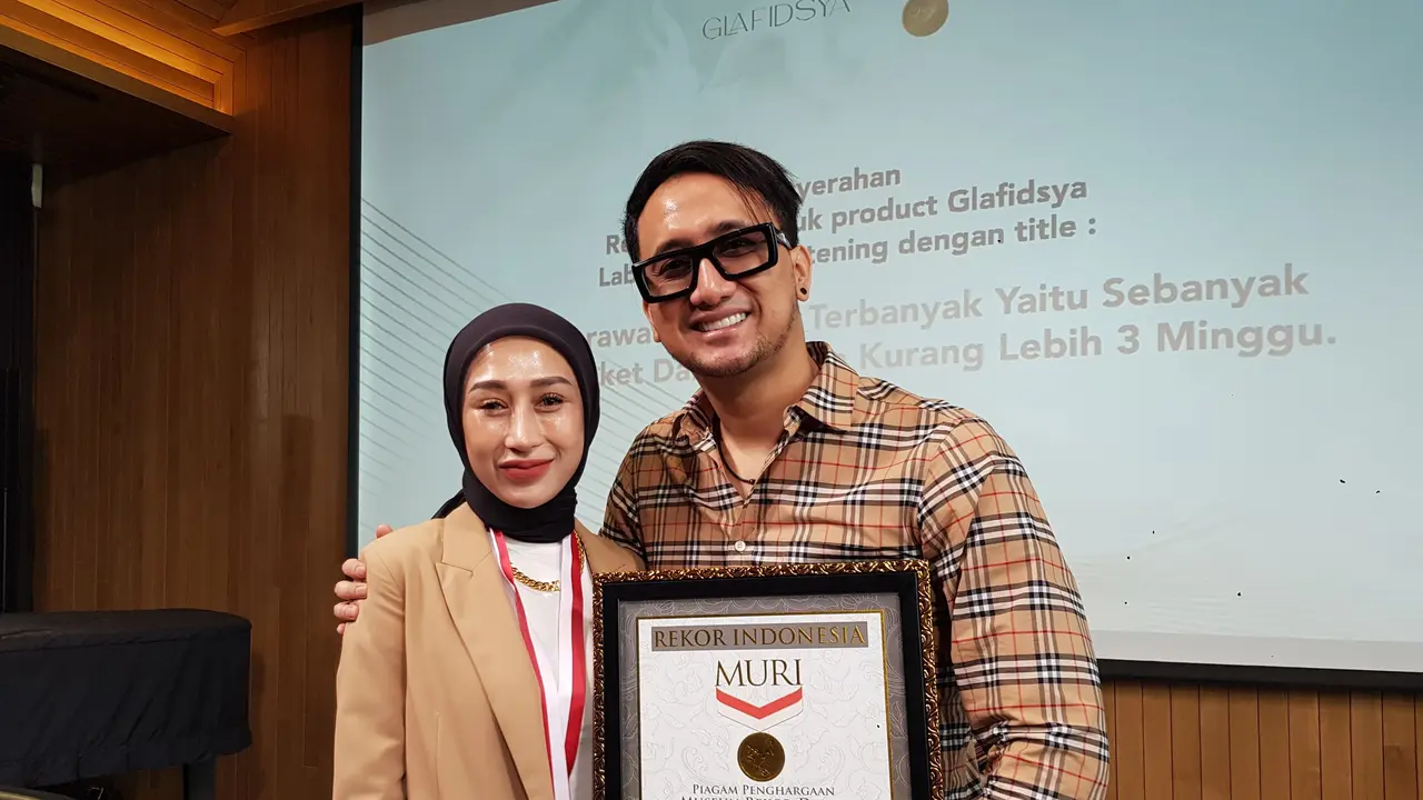 Reza Gladys dan suami (Istimewa)