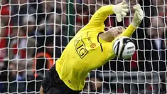 Manchester United's goalkeeper Ben Foster saves a penalty from Tottenham's Jamie O'Hara during the 2009 Carling Cup final at Wembley stadium, on March 1, 2009. AFP PHOTO/ADRIAN DENNIS