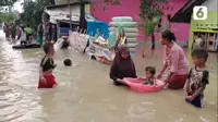 Banjir yang menggenangi ratusan rumah di Kabupaten Cirebon. (tangkapan layar / liputan6.com)