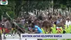 Tembakan senjata api aparat berkali-kali meletus ke udara, begitu pula tembakan gas air mata untuk membubarkan dua kelompok warga yang bertikai.