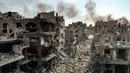 Foto yang diambil pada 11 Oktober 2023 ini menunjukkan pemandangan udara dari bangunan-bangunan yang hancur akibat serangan udara Israel di kamp Jabalia bagi para pengungsi Palestina di Kota Gaza. (Yahya HASSOUNA/AFP)