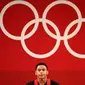 Lifter Indonesia Eko Yuli Irawan meraih medal perak cabang angkat besi 61kg putra pada Olimpiade Tokyo 2020 di Tokyo International Forum, Minggu 25 Juli 2021. (Vincenzo PINTO / AFP)