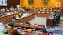 Suasana rapat kerja dengan membahas kesiapan infrastruktur dan transportasi terkait Libur Natal 2022 dan Tahun Baru 2023 di Kompleks Parlemen, Senayan, Jakarta, Selasa (13/12/2022). (Liputan6.com/Angga Yuniar)