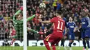 Kiper Paris Saint-Germain, Gianluigi Donnarumma melakukan penyelamatan dalam laga leg kedua Liga Inggris 2024/2025 melawan Liverpool di Anfield, Inggris, Rabu (12/03/2025) WIB.