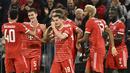 Kemenangan 2-0 tersebut membuat Bayern Munchen menuntaskan laga fase grup dengan sempurna. Ia menjadi satu-satunya tim yang berhasil menyapu bersih laga fase grup Liga Champions dengan kemenangan. (AP/DPA/Sven Hoppe)