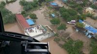 Banjir di desa Abiyana, Gujarat, India. (AFP)