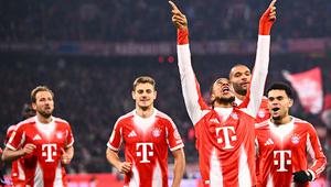 Selebrasi Michael Olise dalam laga Bundesliga antara Bayern Munchen vs Wolfsburg di Allianz Arena, 11 Januari 2026. (Tom Weller/dpa via AP)