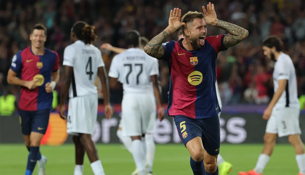 Gol Inigo Martinez pada menit ke-37 semakin memperkokoh keunggulan Barcelona. (LLUIS GENE/AFP)