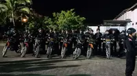 Tim Brimob Satgas Polda Papua di Mapolda Papua, Jayapura, bersiap menggelar patroli malam, Rabu (2/10/2019). (Liputan6.com/Muhammad Radityo Priyasmoro)