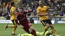 Selebrasi bek Liverpool, Andrew Robertson setelah mencetak gol kedua timnya ke gawang Wolverhampton Wanderers pada laga pekan kelima Premier League 2023/2024 di Molineux Stadium, Wolverhampton, Sabtu (16/9/2023) malam WIB. (AP Photo/Rui Vieira)