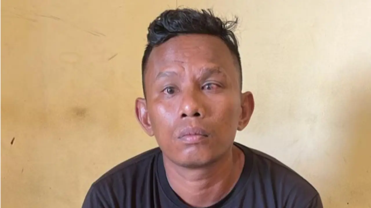Melki Manafe terduga pelaku penipuan pakai hipnotis saat diamankan polisi