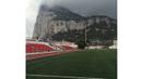 Stadion Victoria di Gibraltar ini terletak di daerah pegunungan dan berkapasitas 5.000 penonton. (Photo/Instagram)