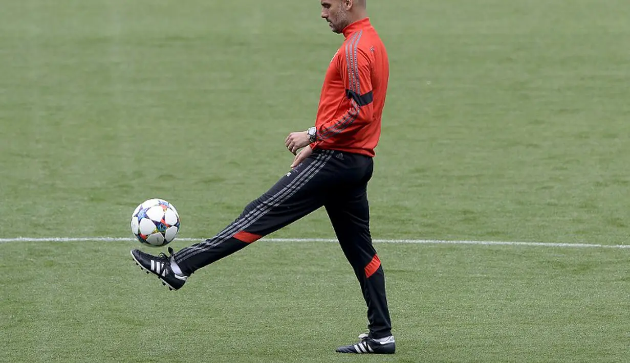 Mantan pelatih Barca, Pep Guardiola yang kini menjadi pelatih Bayern. (AFP PHOTO/ JOSEP LAGO)