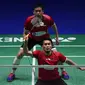 Ganda putra Indonesia, Mohammad Ahsan/Hendra Setiawan melaju ke semifinal Singapura Terbuka 2019 setelah mengalahkan wakil Malaysia, Goh V Shem/Tan Wee Kiong. (AFP/Oli Scarff)