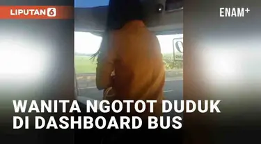 Penumpang bus sejatinya duduk di kursi untuk kenyamanan sepanjang perjalanan. Namun berbeda dengan wanita berbaju kuning berikut yang nekat duduk di dashboard. Kru dan penumpang berusaha membujuk wanita tersebut namun tak diindahkan.