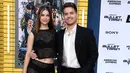 <p>Aktor Dylan Sprouse (kanan) dan model Barbara Palvin menghadiri pemutaran perdana film Bullet Train di Regency Village Theatre, Los Angeles, California, Amerika Serikat, 1 Agustus 2022. Pasangan yang telah berkencan sejak 2018 ini tersenyum saat melintasi karpet merah sebelum pemutaran perdana film Bullet Train. (Jon Kopaloff/Getty Images/AFP)</p>