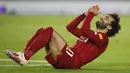Mohamed Salah termasuk di dalam pemain yang kerap dituduh diving, salah satunya dari pemain Manchester City, Ruben Dias. Dirinya dianggap sering bereaksi berlebihan jika terkena lawan, baik di dalam kotak pinalti maupun di luar. (Foto:  AFP/Pool/Paul Childs)