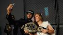Ronda Rousey saat hadir dalam salah satu acara UFC dan Reebok. (Brad Barket/Getty Images for Reebok/AFP)
