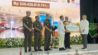 BPA Kejagung mengembalikan dana senilai Rp 229,4 miliar kepada korban kasus penggelapan dana nasabah Koperasi Simpan Pinjam (KSP) Indosurya. (Liputan6.com/Devira Prastiwi)