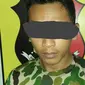 Dede (25) tersangka Marinir Gadungan. (Foto: Liputan6.com/Kodim Cilacap/Muhamad Ridlo)