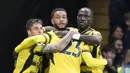 Pemain Watford Joshua King merayakan dengan rekan setimnya usai mencetak gol ke gawang Manchester United pada pertandingan sepak bola Liga Inggris di Vicarage Road, Watford, Inggris, 20 November, 2021. Watford menang 4-1. (AP Photo/Frank Augstein)