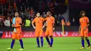 Pemain timnas Belanda bereaksi pada laga terakhir babak penyisihan Grup A Piala Dunia 2018 zona Eropa melawan Swedia di Amsterdam Arena, Rabu (11/10). Meski mengalahkan Swedia 2-0, Belanda tetap gagal melaju ke Piala Dunia 2018. (EMMANUEL DUNAND/AFP)