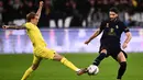 Pada menit ke-24, Juventus unggul jumlah pemain usai Romagnoli mendapat ganjaran kartu merah. (MARCO BERTORELLO/AFP)