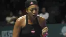 Di final Naomi mengalahkan Serena Williams dengan straight set. Hal tersebut menjadikan Naomi Osaka sebagai petenis wanita yang paling dicari di halaman google pada tahun 2018. (AFP/Roslan Rahman)