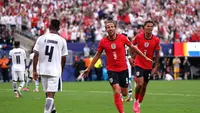 Harry Kane merayakan gol kedua yang dicetaknya untuk Timnas Inggris dalam pertandingan Grup L Piala Dunia 2026 melawan Panama di Stadion MetLife, Minggu (28/6/2026). (Mattia Ozbot/Getty Images/AFP)

Kredit foto: Mattia Ozbot / Getty Images North America / Getty Images via AFP.