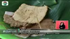 Satu porsi cabuk rambak berisi ketupat yang disiram saus berwarna coklat yang terbuat dari biji wijen yang digiling halus.