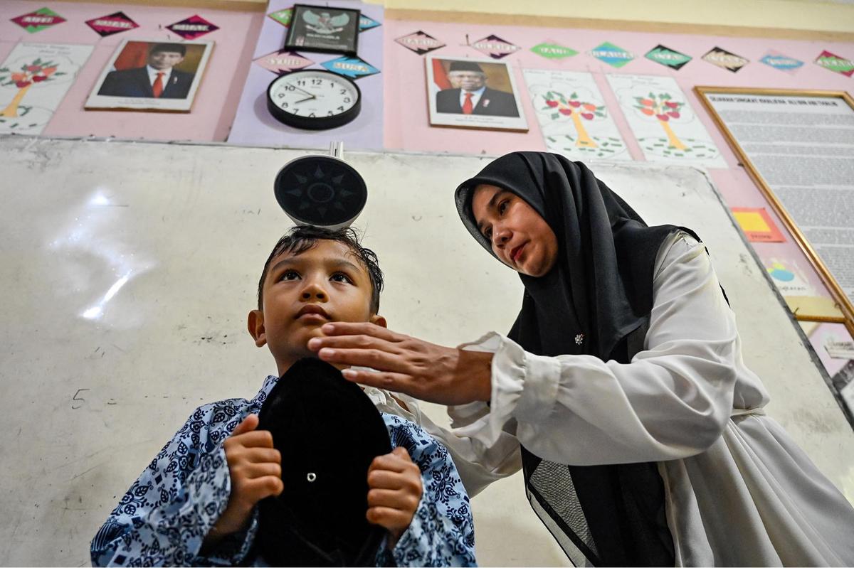 FOTO: Antusias Murid Madrasah Jalani Pemeriksaan Kesehatan Gratis