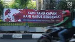 Spanduk dukungan untuk Gatot Nurmantyo terpampang di kawasan Cikini, Jakarta, Minggu (1/4). Terdapat tulisan "Pemimpin masa depan Indonesia 2019-2024," pada spanduk yang tidak diketahui siapa pemasangnya. (Liputan6.com/Helmi Fithriansyah)