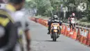 Pebalap memacu sepeda motor saat mengikuti Street Race Polda Metro Jaya di Kawasan Ancol, Jakarta Utara, Minggu (16/1/2022). Sebanyak 350 pebalap turut meramaikan balap jalanan bersama komunitas Street Race di Ancol. (merdeka.com/Iqbal S. Nugroho)